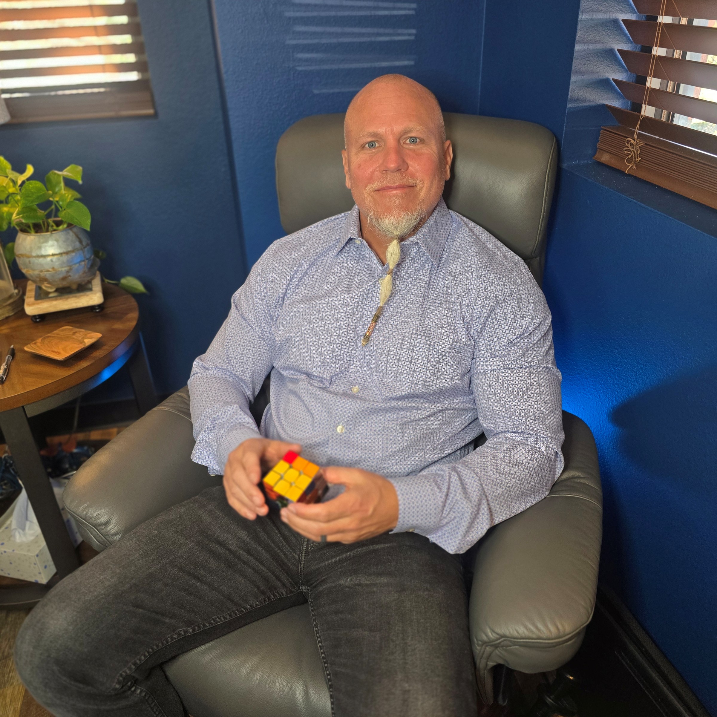 Chris is solving a rubicks cube!